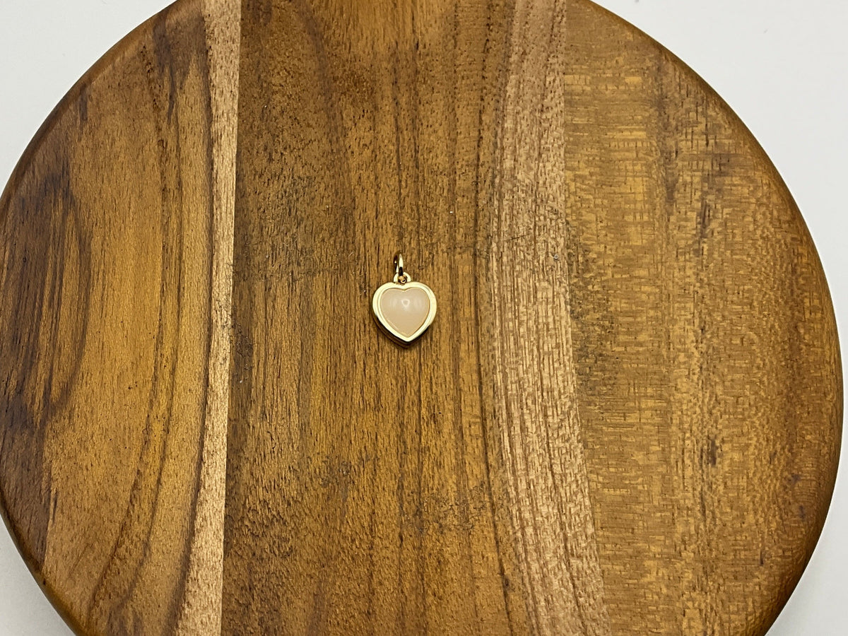 Gold heart charm