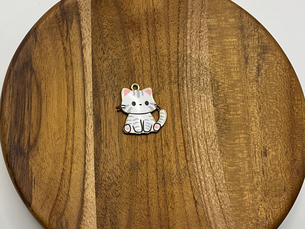 White and grey cat charm