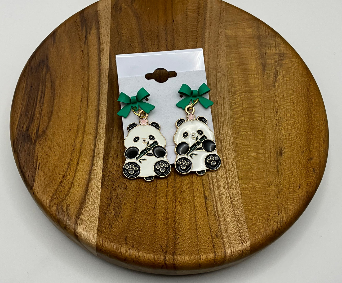 Panda earrings with green bows