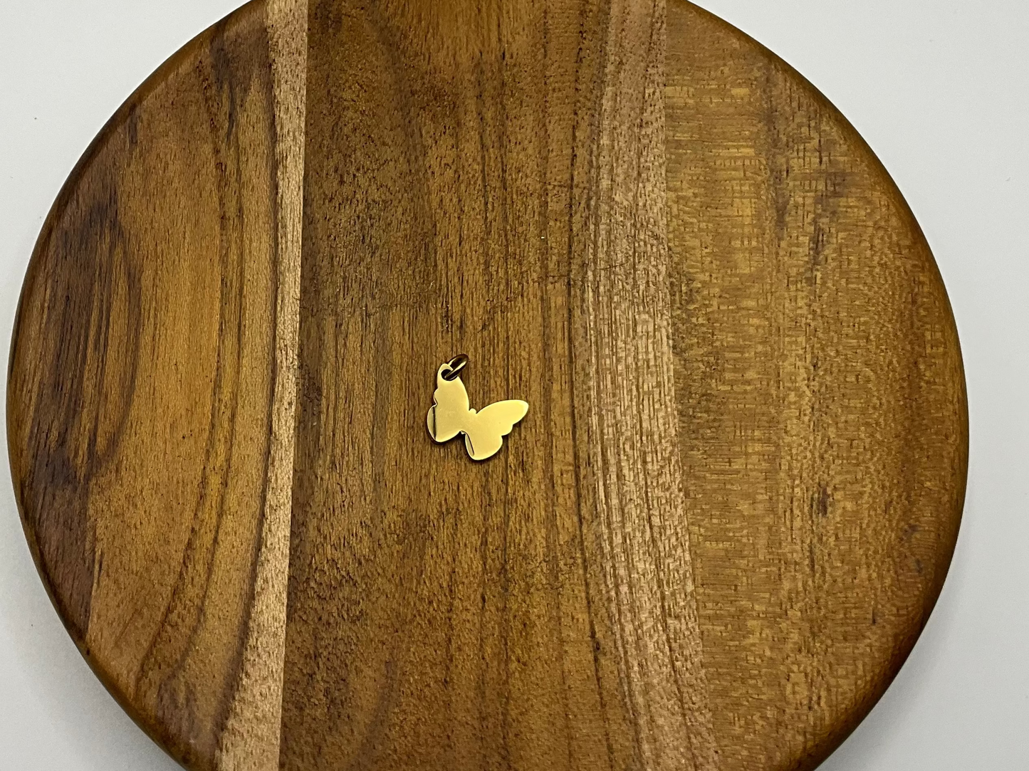 Gold butterfly charm