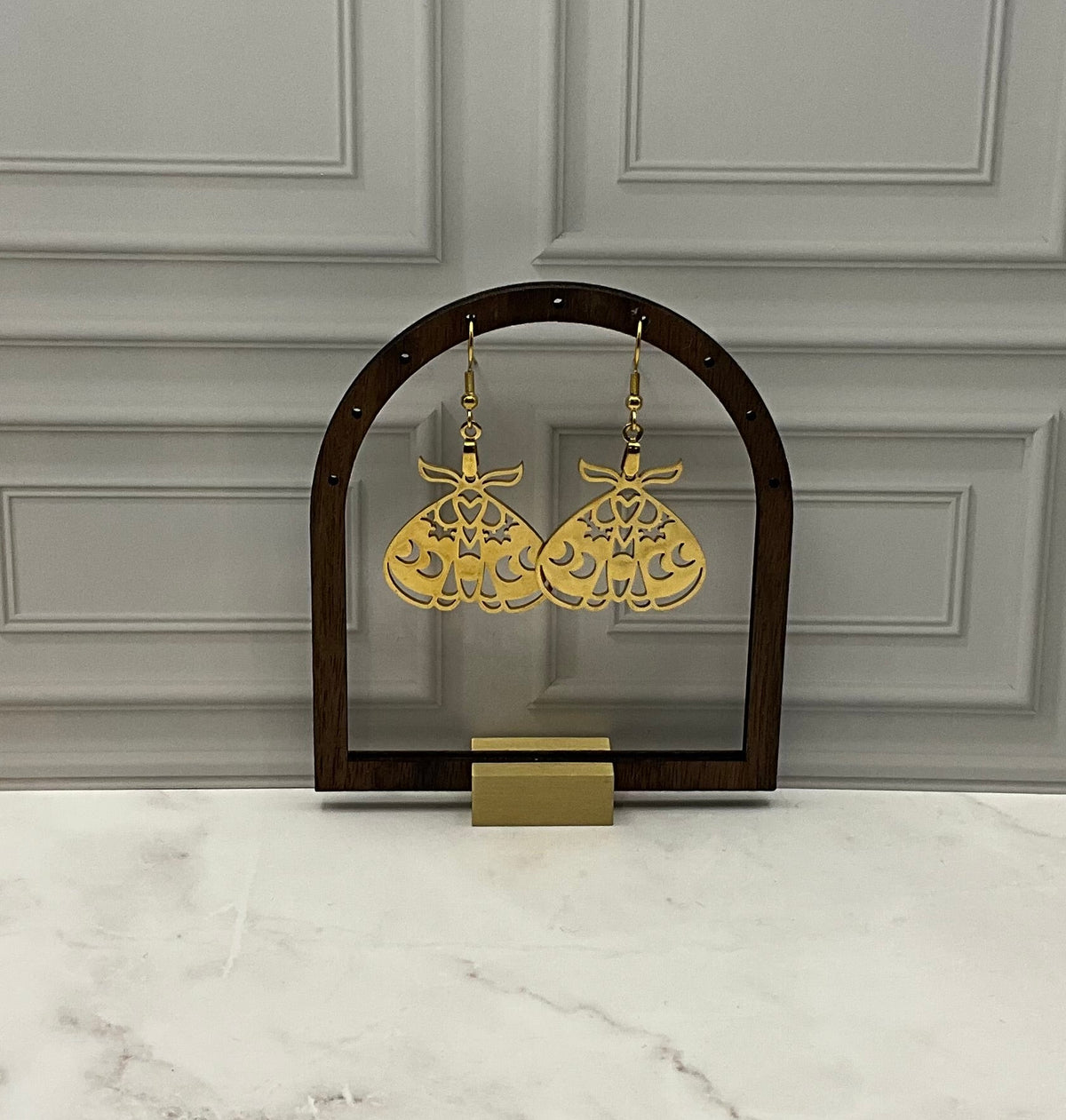 Gold moth earrings