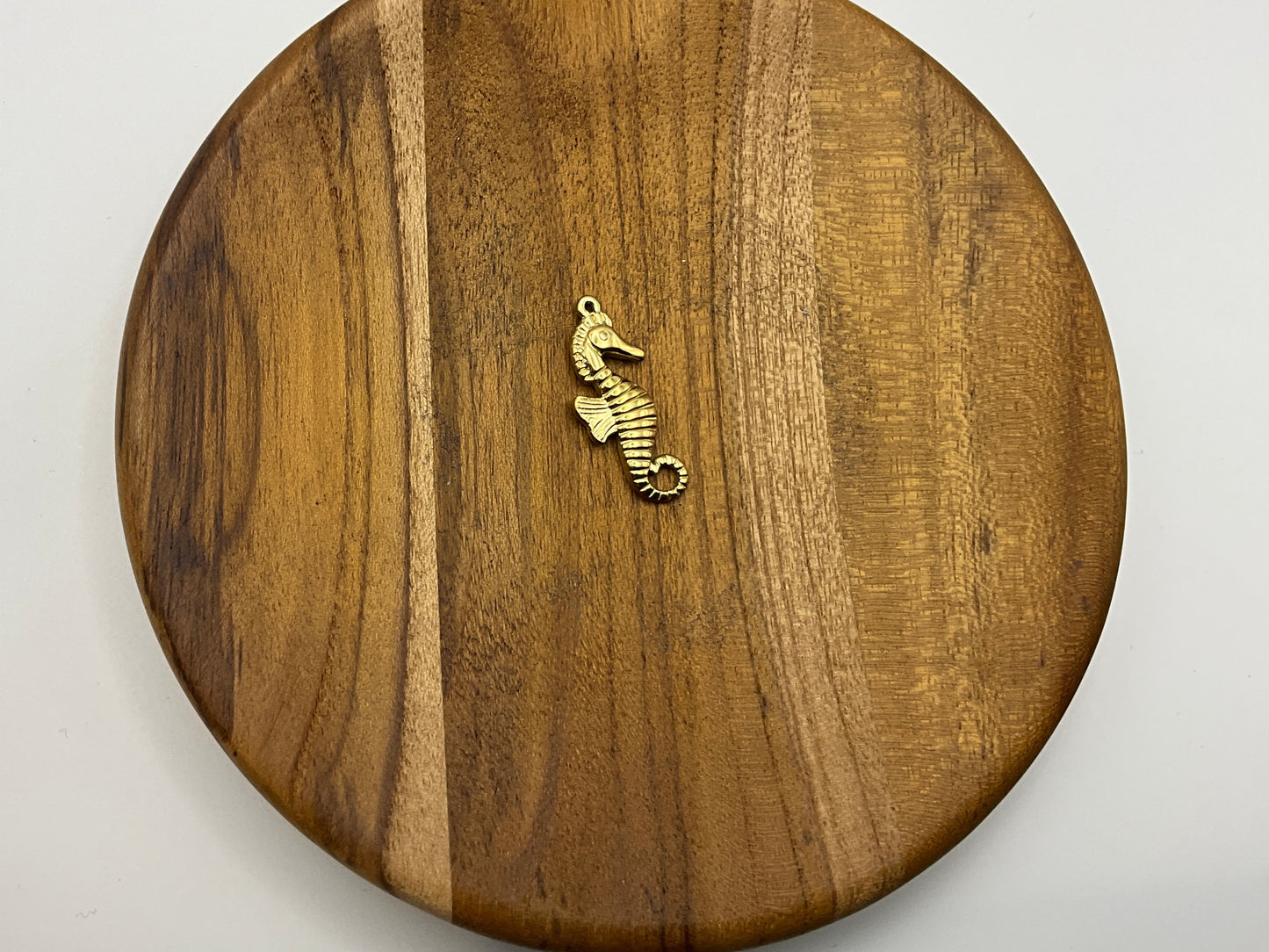 Gold seahorse charm